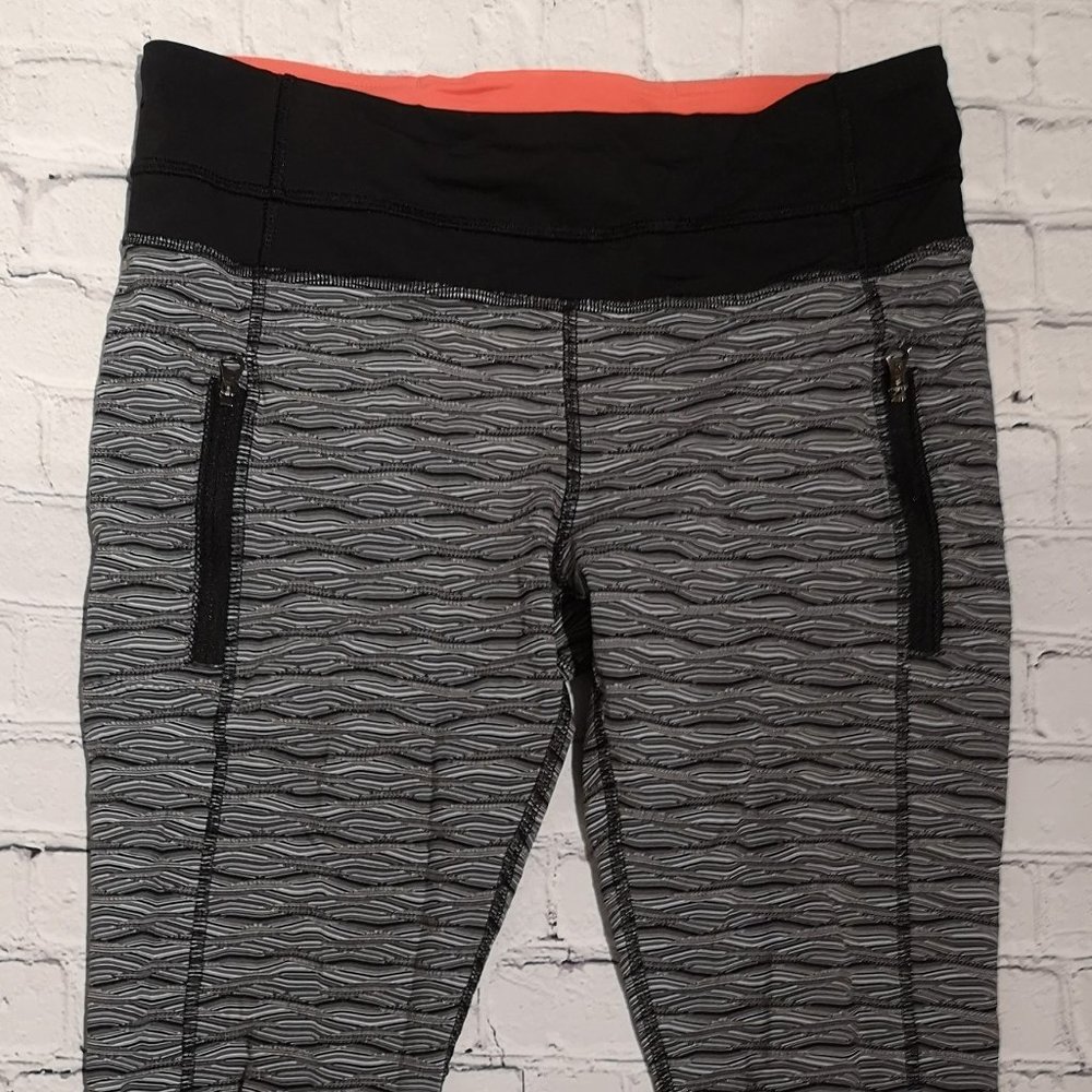 Lululemon Inspire Tight II with zippers 25"